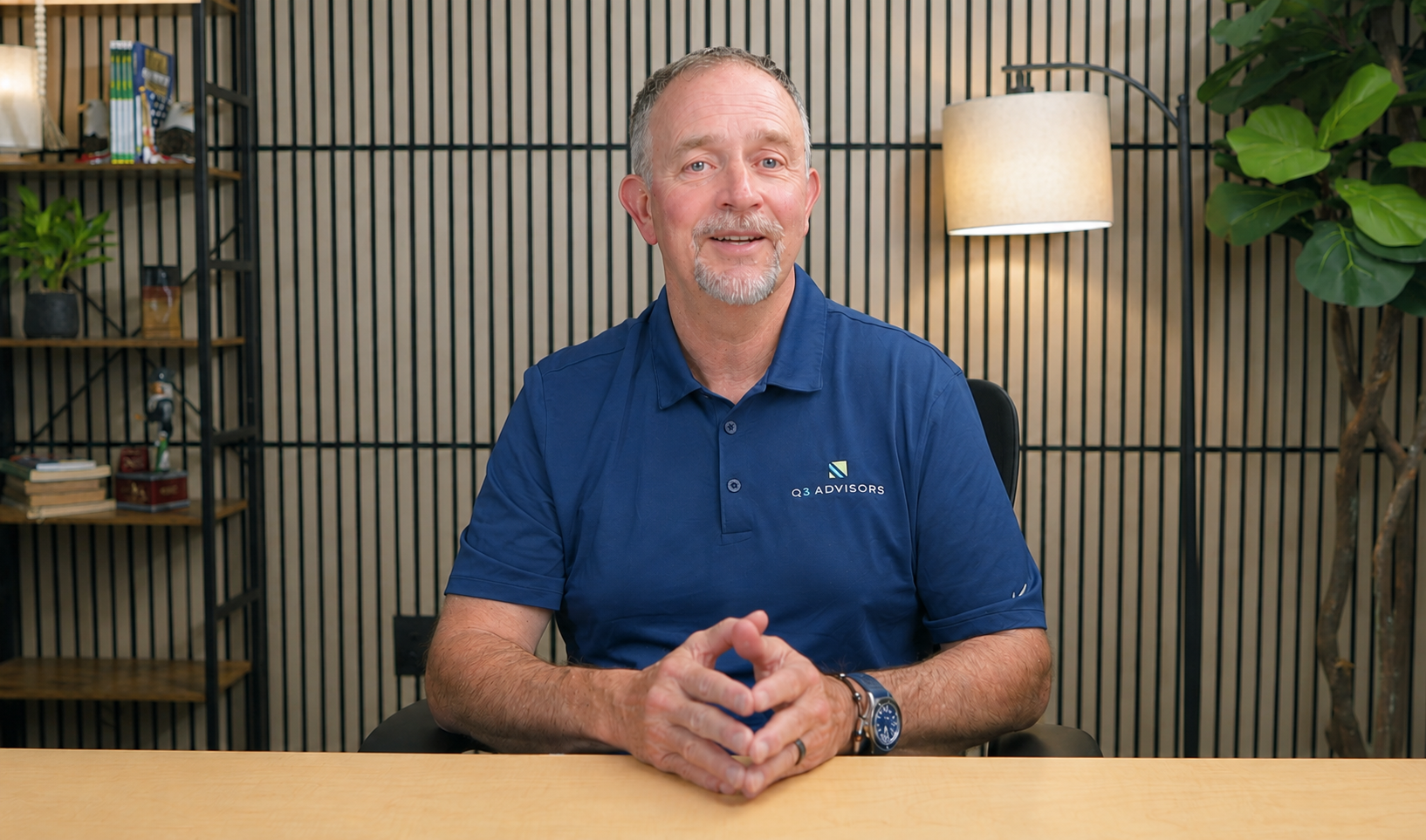 Craig Wear, CFP®, founder of Q3 Advisors, in his studio